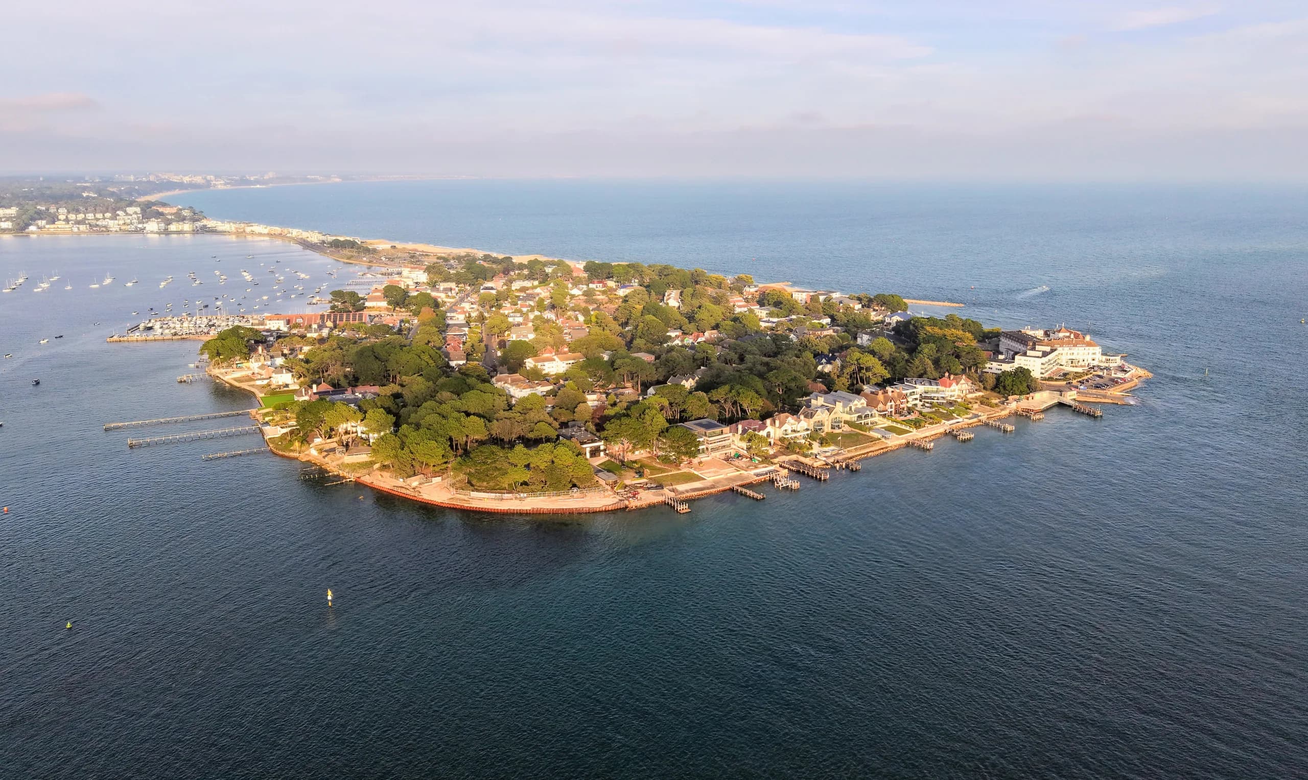 Aerial view of Sandbanks Millionaires' Row, waterfront homes and Poole Harbour in Dorset